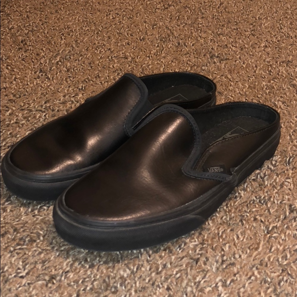 Black leather Vans slip ons
